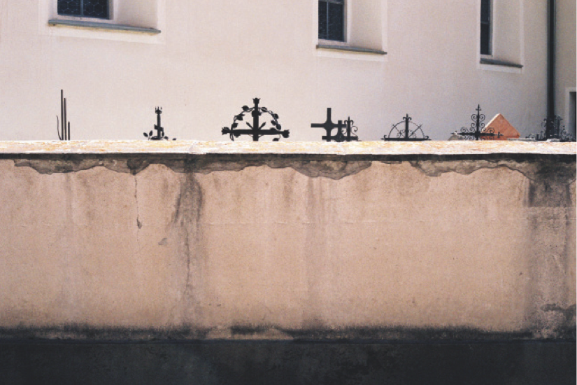 Fence with crosses over it 