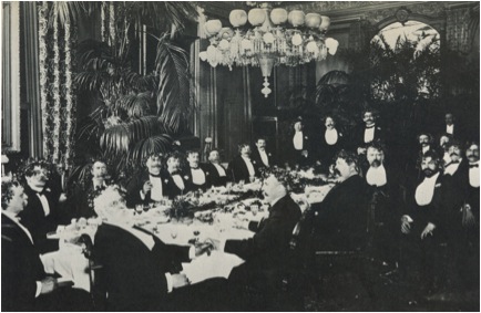 long table with people seated around