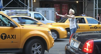 woman in front of taxi