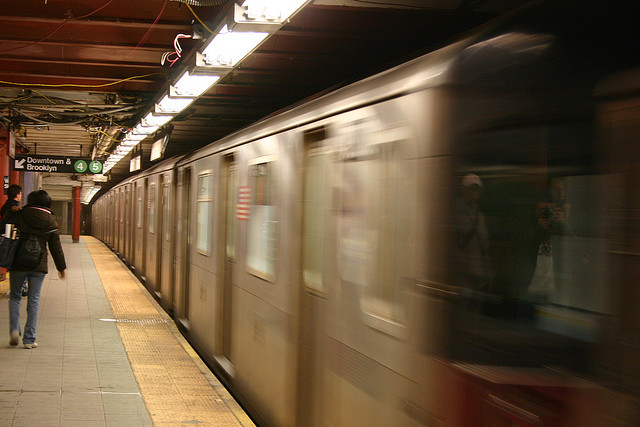 On the Subway: the Comfort of Fingers Entwined