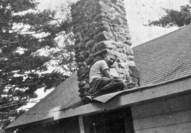 One man on a roof