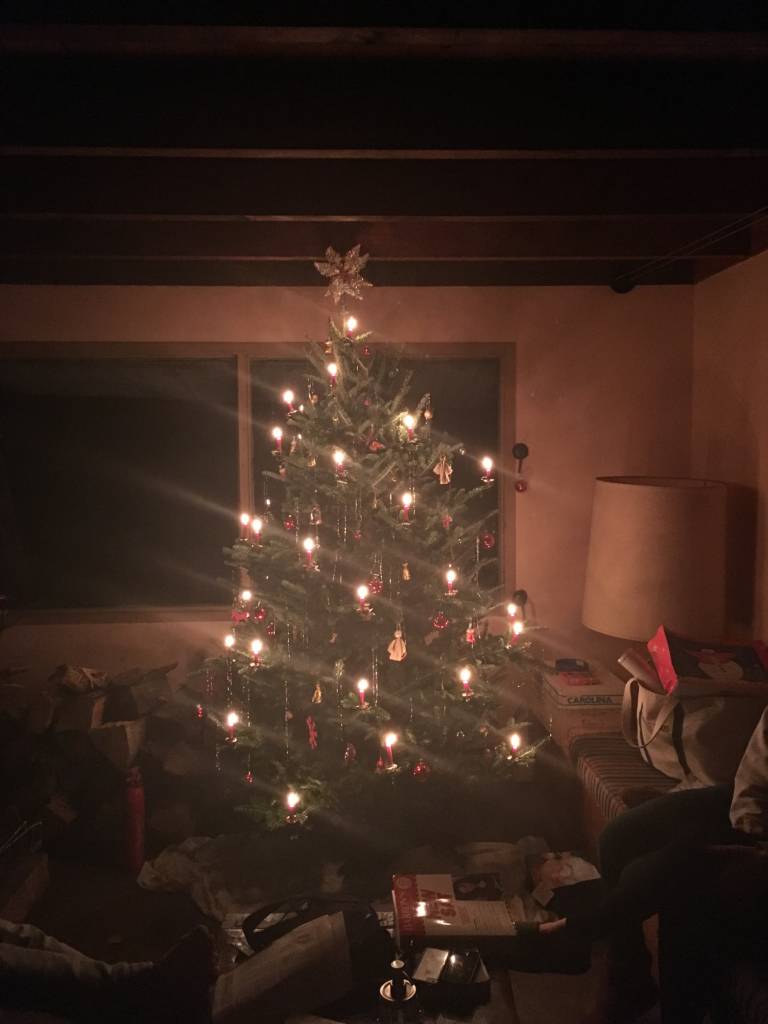 Christmas tree with candles on it