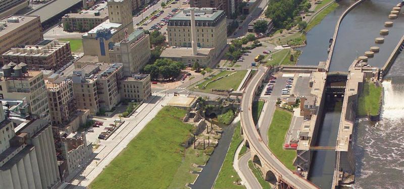 birds eye view of buildings and park