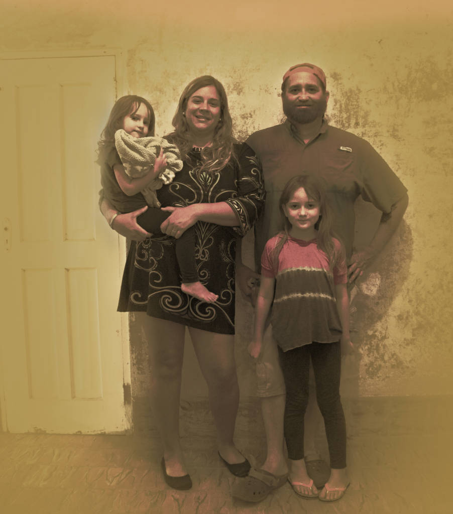 Photo of a family with two young girls