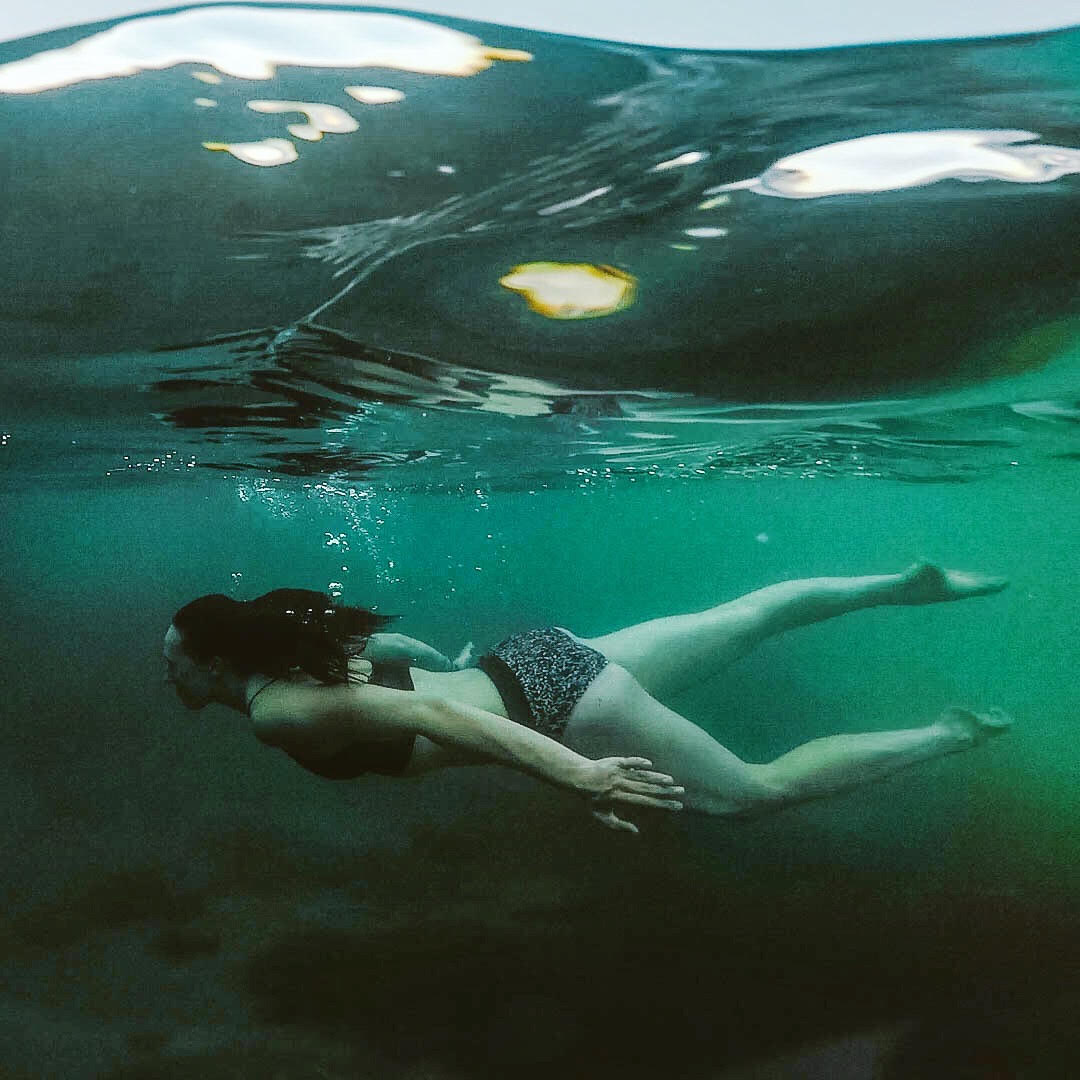 Photo of woman swimming in ocean