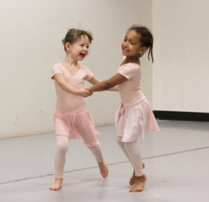 Image of two girls dancing