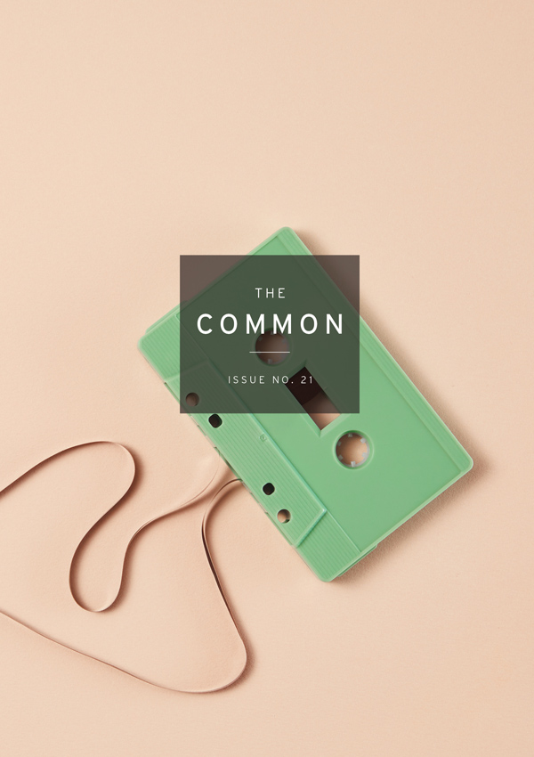 The Common Issue 21 cover with a green cassette tape on a creamy beige background