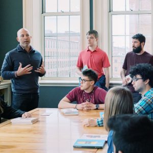 Image of a classroom discussing The Common.