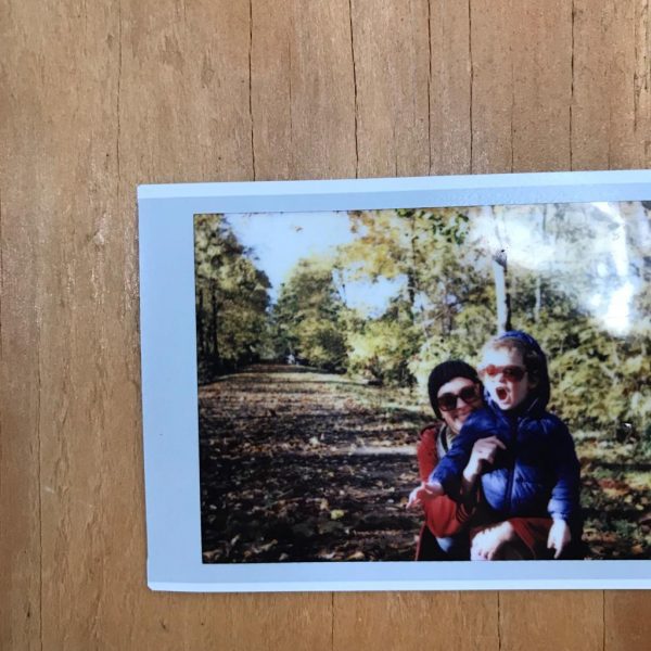Image of a photo of two people in a park.
