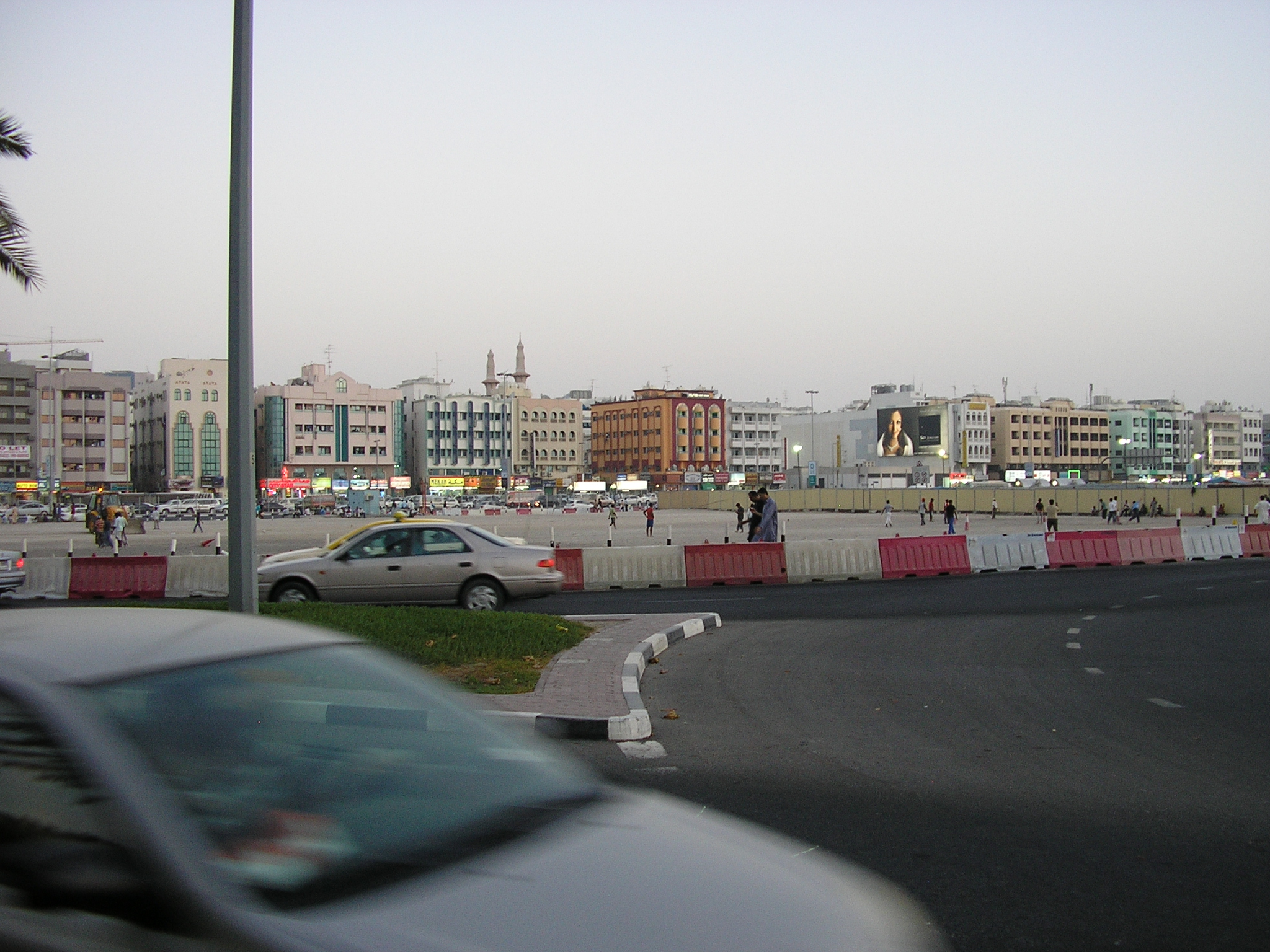 White sedan outside Al Khaleej road.