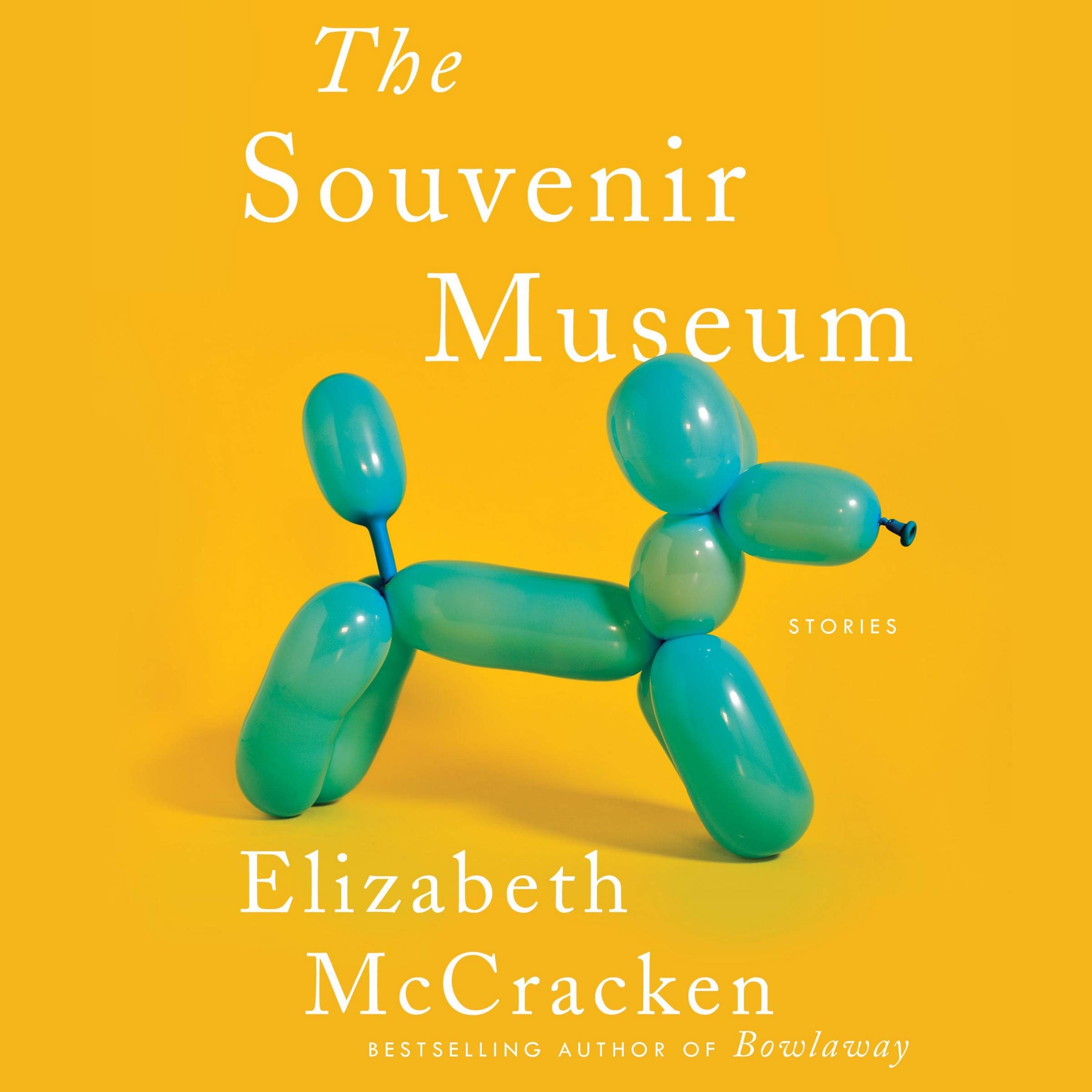 Cover of The Souvenir Museum by Elizabeth McCracken, the anthology from which this piece is excerpted. The cover shows a teal balloon dog on a bright yellow background, with the title and author's name in white sans serif font.