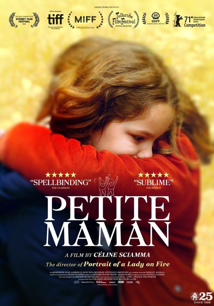 cover of petite maman. shows two girls hugging each other