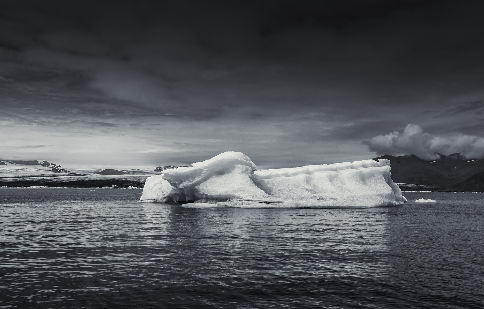 Large image of an iceberg, a black and white photo
