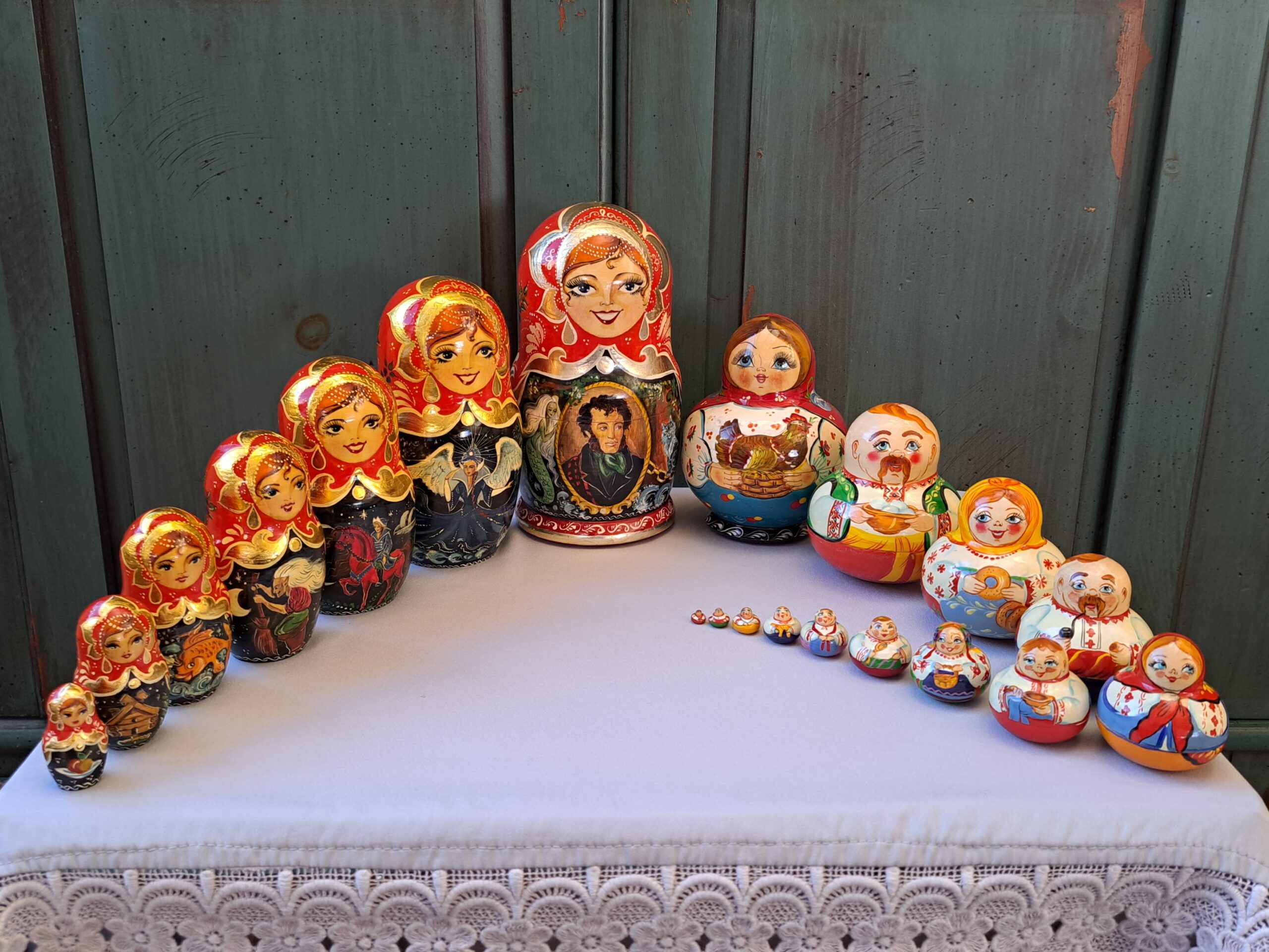 a row of red nesting dolls