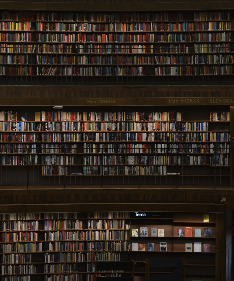 books on shelves at a library