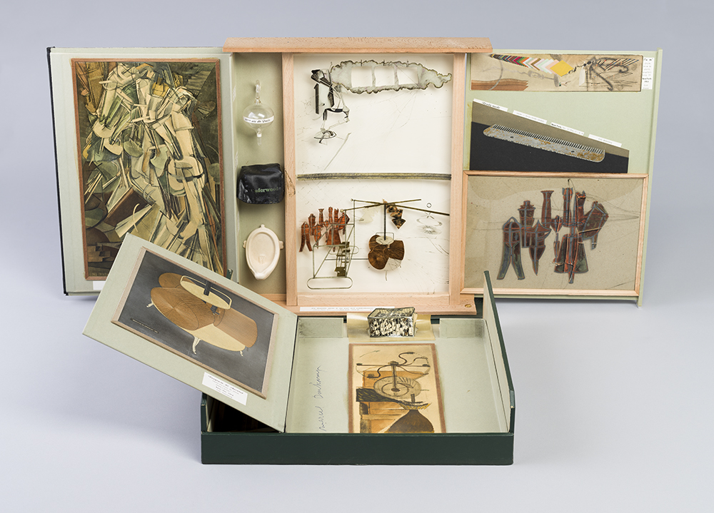Marcel Duchamp's Boite: a box that folds out to reveal miniatures of various art works.