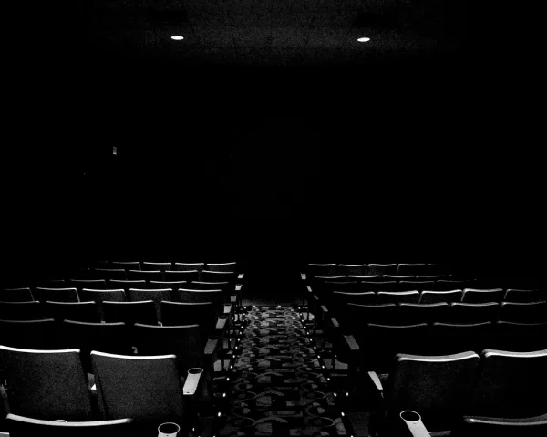 A dark movie theater.