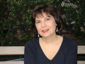 Headshot of Maria Terrone, white woman with dark hair