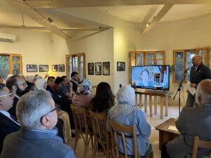 Spectators watching the reading event in Amman