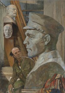 Man looks at huge sculpture of a bust.