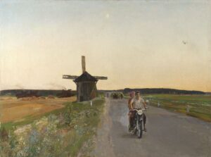 Two people ride a motorcycle down a road. Windmill behind them.