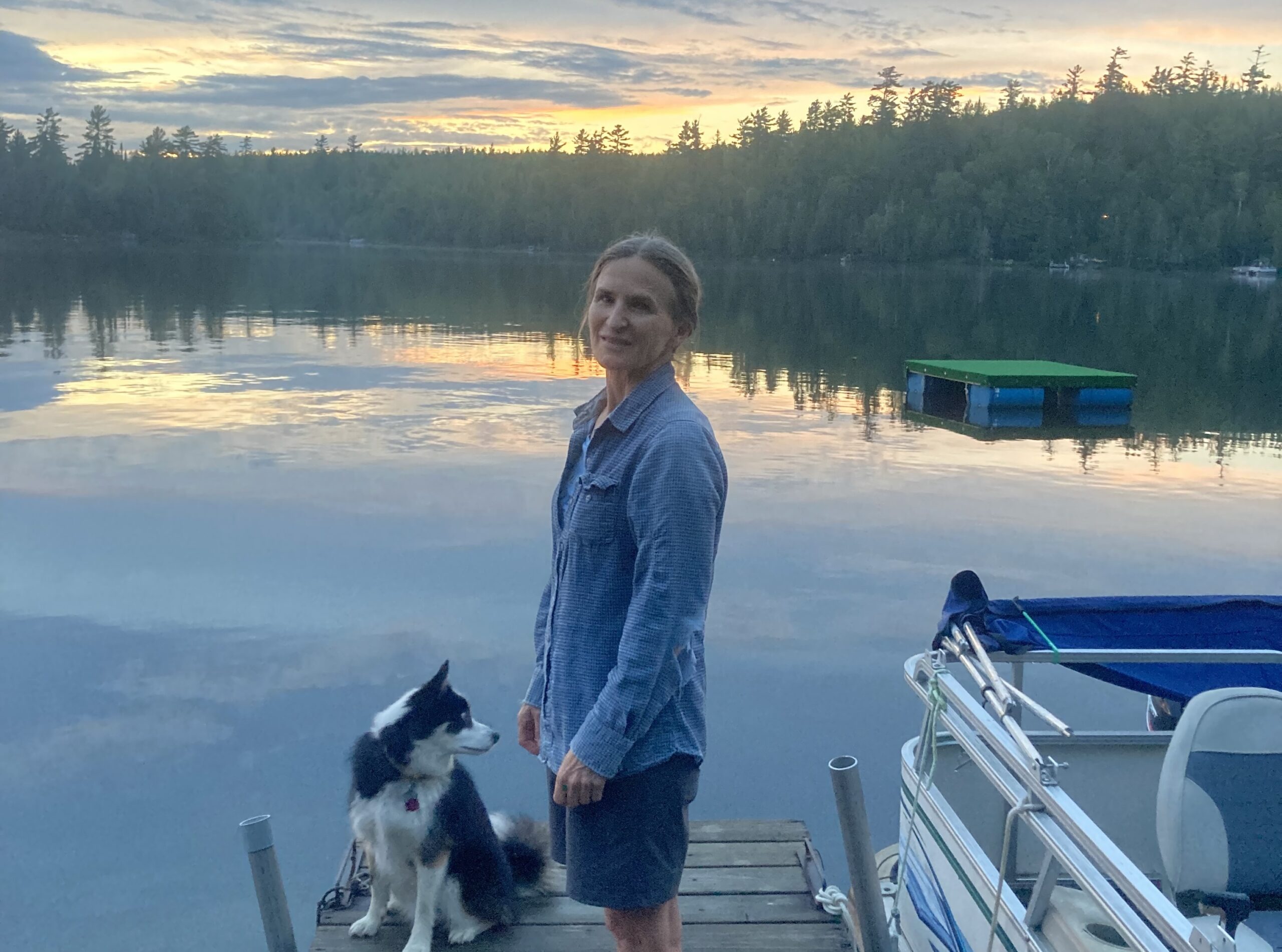 rebecca on a dock at sunset