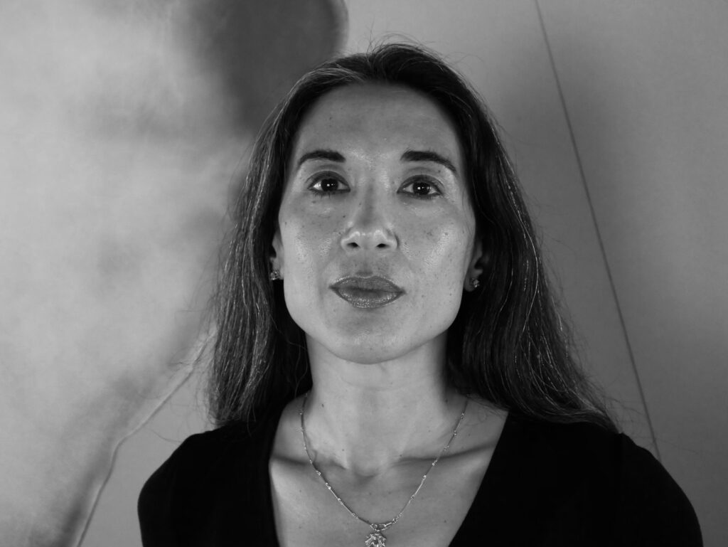 headshot of the author black and white