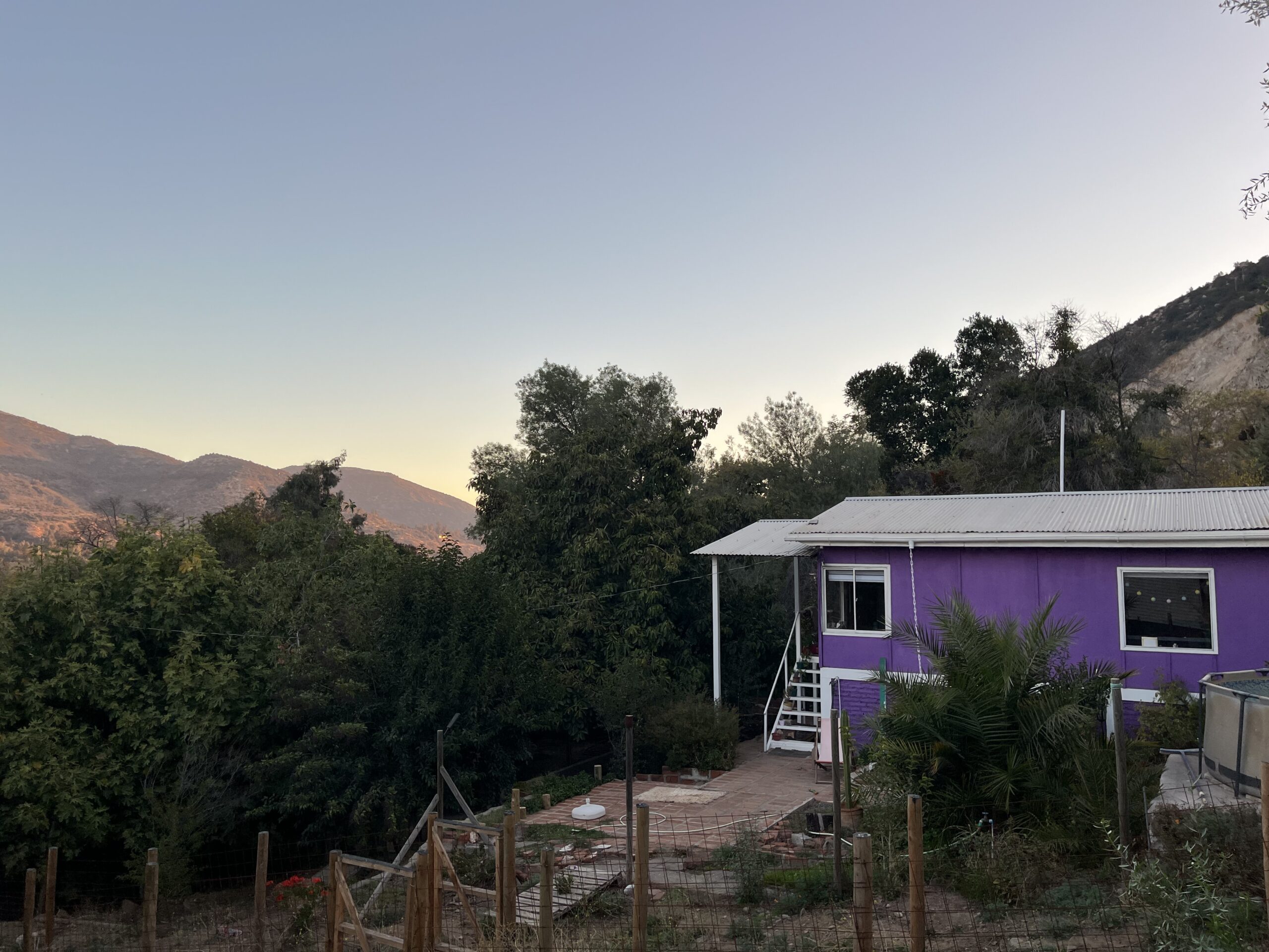 Picture of purple house and mountains